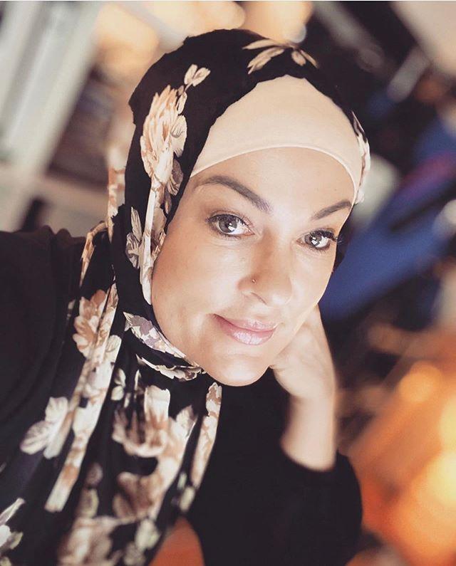 Black Floral Botanica Hijab worn... - Divinity Collection