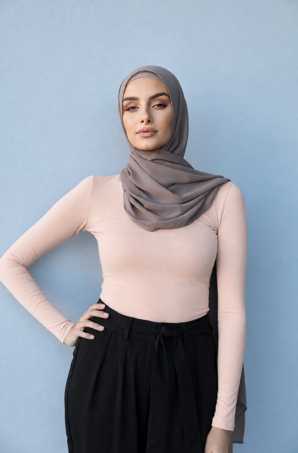 Rose Quartz long sleeve cotton top on a model — AI-generated styling illustration